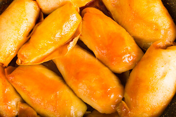 National Ukrainian dish with rice, meat wrapped cabbage on the pan. Delicious food - cabbage rolls.