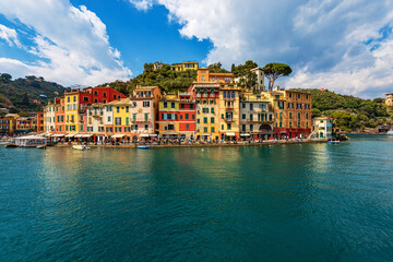 Obraz na płótnie Canvas Famous village of Portofino, luxury tourist resort in Genoa Province, Liguria, Italy, Europe. Port and colorful houses, Mediterranean sea (Ligurian sea).