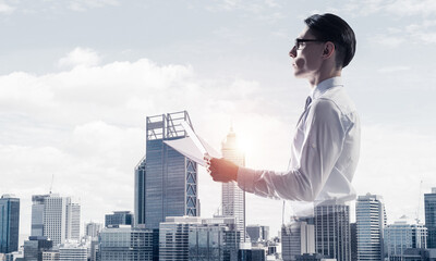 Concept of business success and control with confident boss against cityscape background