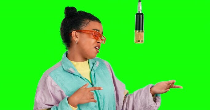 Green screen microphone, rapper and woman singing song, recording voice track, hip hop music and singer performance. Retro musician, chroma key artist and gen z female rap on radio studio background