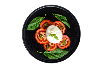 Burrata cheese and tomatoes salad served on black plate.  Isolated, transparent background