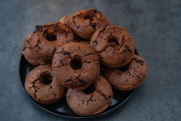 sweet home made chocolate chip donuts on a table