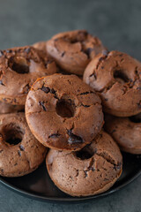 sweet home made chocolate chip donuts on a table