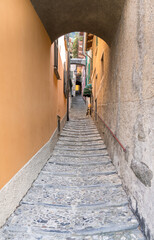 Fototapeta na wymiar Narrow street in Varenna, Como Lake, Italy