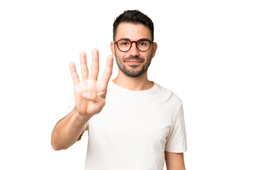 Fototapeta premium Young handsome caucasian man over isolated chroma key background happy and counting four with fingers