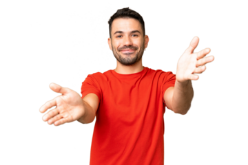 Young handsome caucasian man over isolated chroma key background presenting and inviting to come with hand