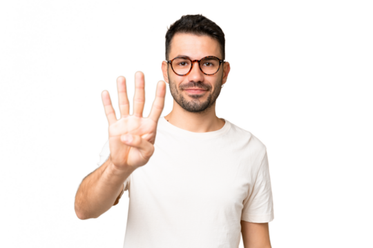 Young handsome caucasian man over isolated chroma key background happy and counting four with fingers