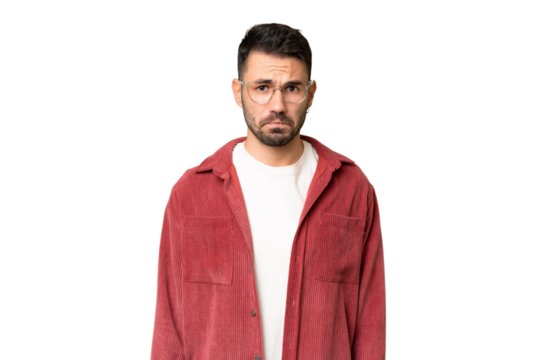 Young handsome caucasian man over isolated chroma key background with sad expression