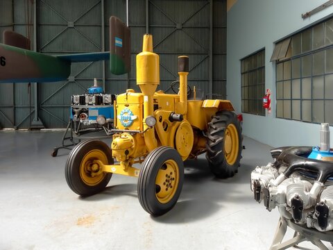 Old yellow IAME Pampa agricultural tractor 1952, Argentine version of Lanz Bulldog D9506.