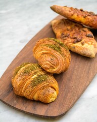 Freshly baked bread on a wooden plate