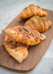 Freshly baked bread on a wooden plate