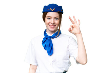Airplane stewardess over isolated chroma key background showing ok sign with fingers