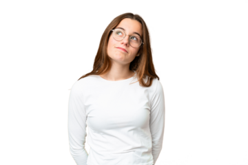 Teenager girl over isolated chroma key background and looking up