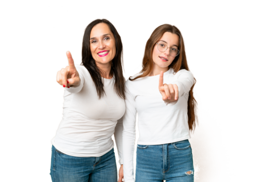 mother and daughter over isolated chroma key background showing and lifting a finger