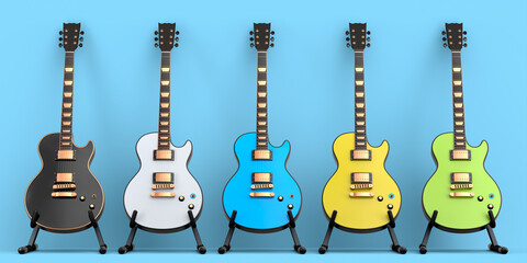 Naklejka premium Set of electric acoustic guitar isolated on blue background.