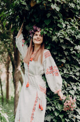 Ukrainian woman in national costume, rustic style. Ukraine. Soft blurred focus