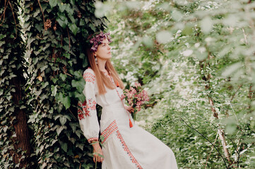 Ukrainian woman in national costume. Ukraine. Soft blurred focus