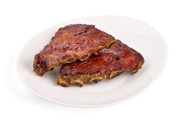 Delicious spicy marinated ribs in a bbq or tomato sauce, isolated on a white background.