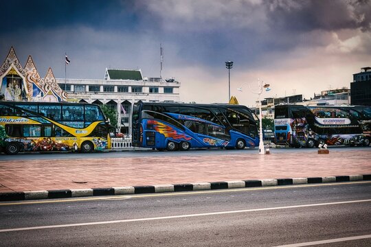 City tour buses parked at the station in Bangkok, Thailand