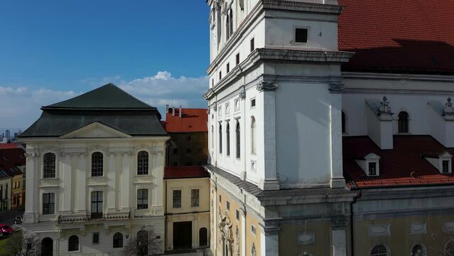 Drone is taking off next to Trnava St John the Baptist Cathedral, Slovakia, 4k