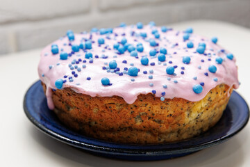 Glazed poppy easter cake with blue ...