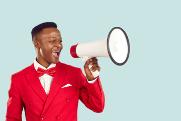 Discounts, sales and marketing. Stylish elegant african american man with megaphone making loud...