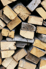 wooden background with stack of firewood 
