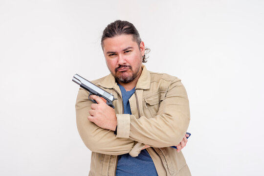 A cocky and smug goon holding a gun. Isolated on a white background.