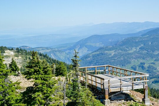 Wooden observation deck in the mountains in sunlight