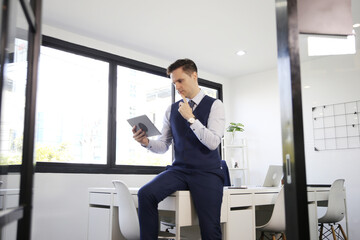 Business discussions. Shot of business people discussing and  brainstorming in an office