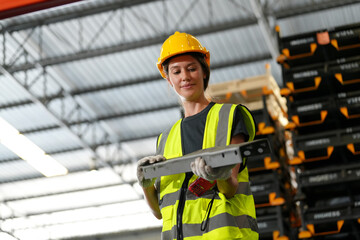 Multiethnic industrial workers checking their logistic lists while working with transportation of...