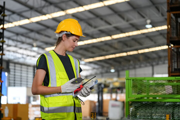 Multiethnic industrial workers checking their logistic lists while working with transportation of...