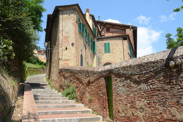 Fototapeta premium ancient Tuscan brick house typical of the Sienese area.