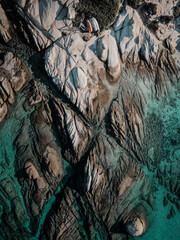 Drone top down photo of rock formation at beach Kavourotripes Chalkidiki