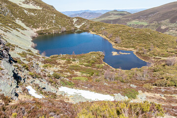 Fototapeta na wymiar lagoon of glacial origin in the port of Leitariegos in Asturias, Spain