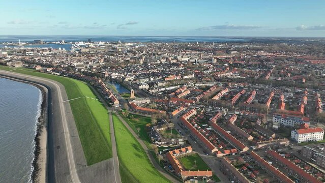 Captivating aerial footage of Den Helder city and its stunning coastal views, showcasing the city's unique charm and vibrant maritime culture.