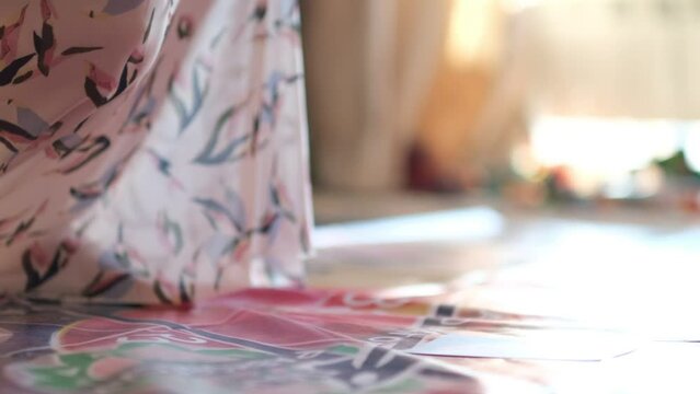 woman is immersed in the game of Leela, highlighting how this board game differs from traditional ones by focusing on personal growth, introspection, and the pursuit of harmony in one's life.