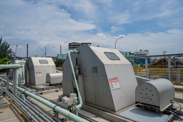 Sea water intake pump equipment on power plant project. The photo is suitable to use for industry background photography, power plant poster and electricity content media.