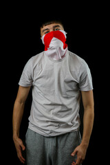 Teenage boy england mask black background