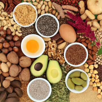 Nutritious health food high in essential fatty acids of healthy lipids. Ingredients contain unsaturated fats for healthy heart and cholesterol levels with nuts, dairy, vegetables, seeds, legumes.