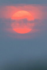 Big sun and the clouds