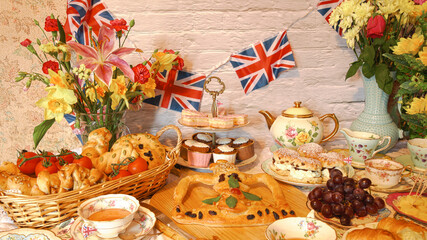 King Charles And Camilla's Coronation celebration  tea party  street  party   crown stalled  bread 