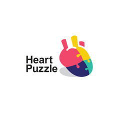 multicolored puzzle heart logo vector icon illustration