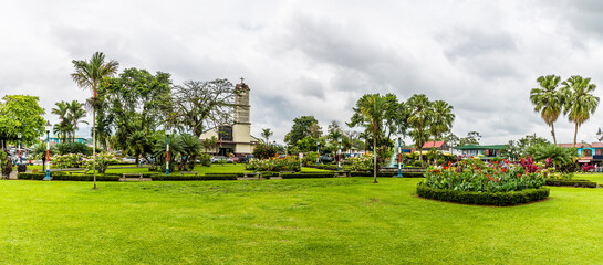 A panorama view west across the Central Park in La Fortuna, Costa Rica in the dry season