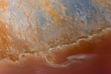Aerial shot of oxidized iron minerals in water in old mining area, Río Tinto. Huelva Province,...