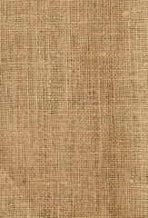 Vertical shot of some rough burlap canvas background