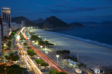 Copacabana Beach, and Avenue Atlantica at night, Copacabana, Rio de Janeiro, Brazil