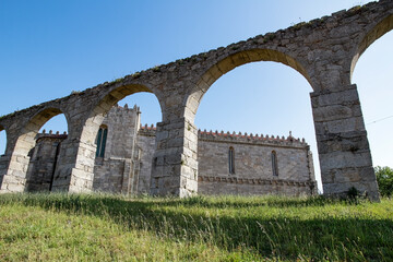 Fototapeta na wymiar Medieval monastery and aqueduct