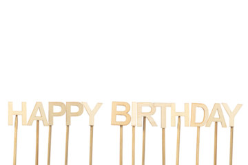 Happy Birthday sign made with individual wooden letters on a green chroma background.