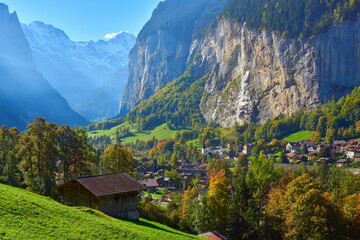 Fototapeta premium Morning view of Staubbach falls and Lauterbrunnen village in Switzerland.